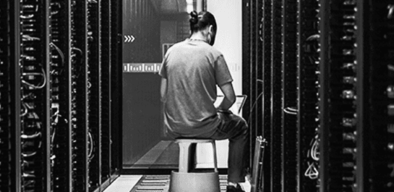 Engineer working in a data center during an incident